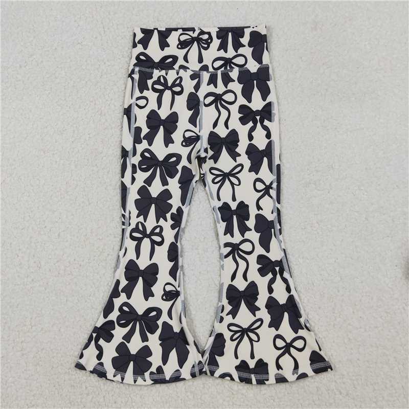 X109 P0775 Beige yoga pants with black bow pattern