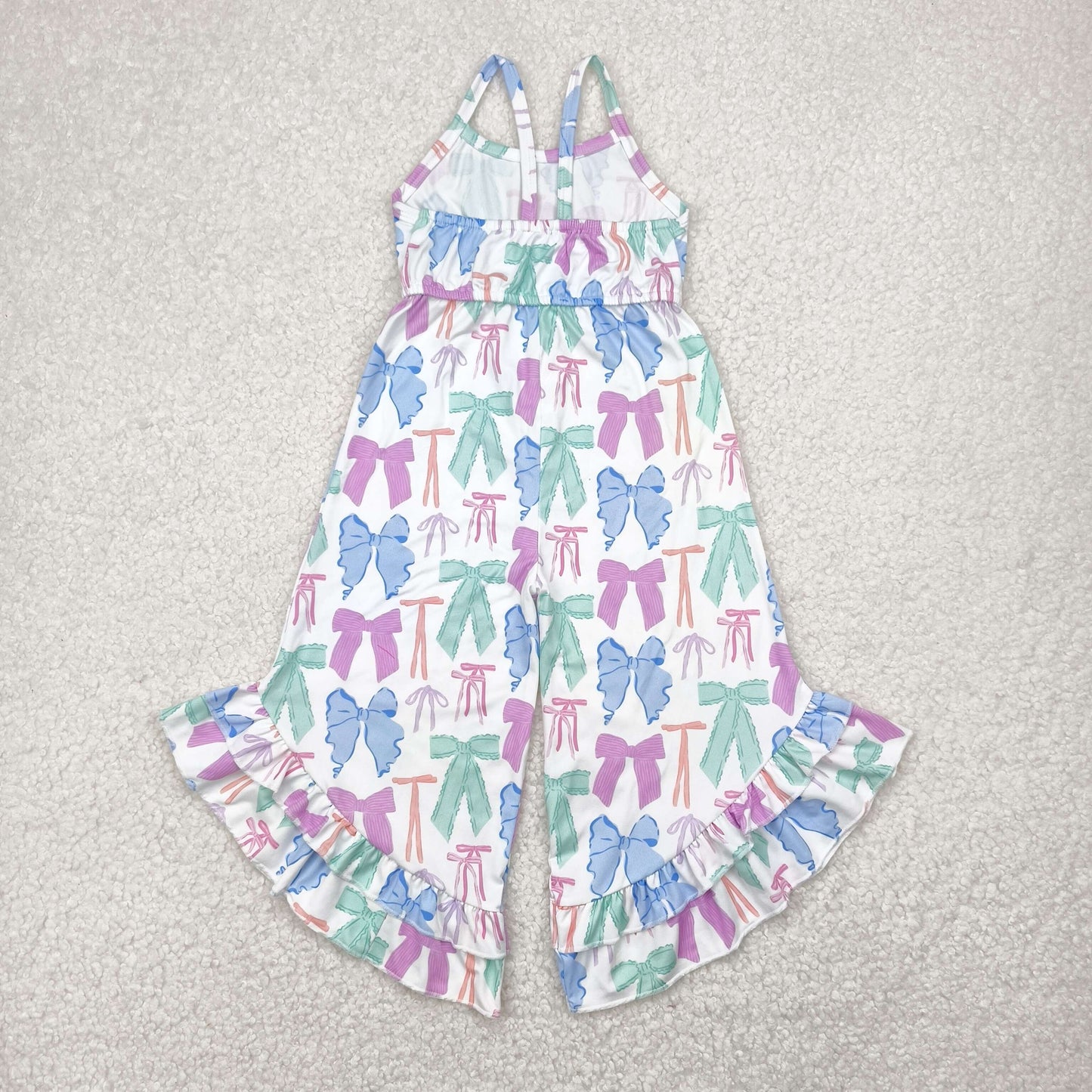 4.24 SR2847 White suspender jumpsuit with colorful bow pattern