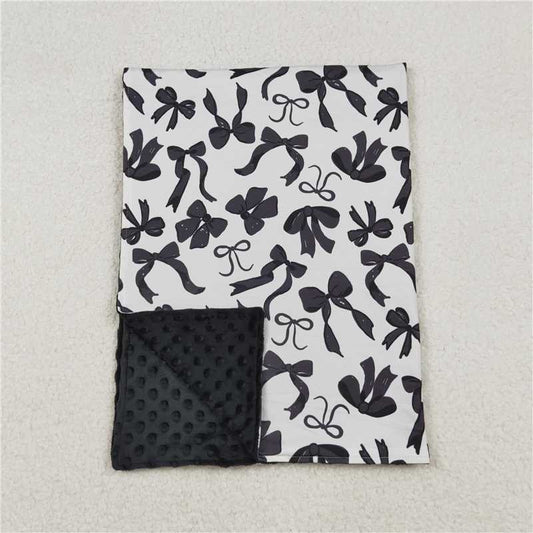 X109 BL0217 Beige baby blanket with black bow pattern