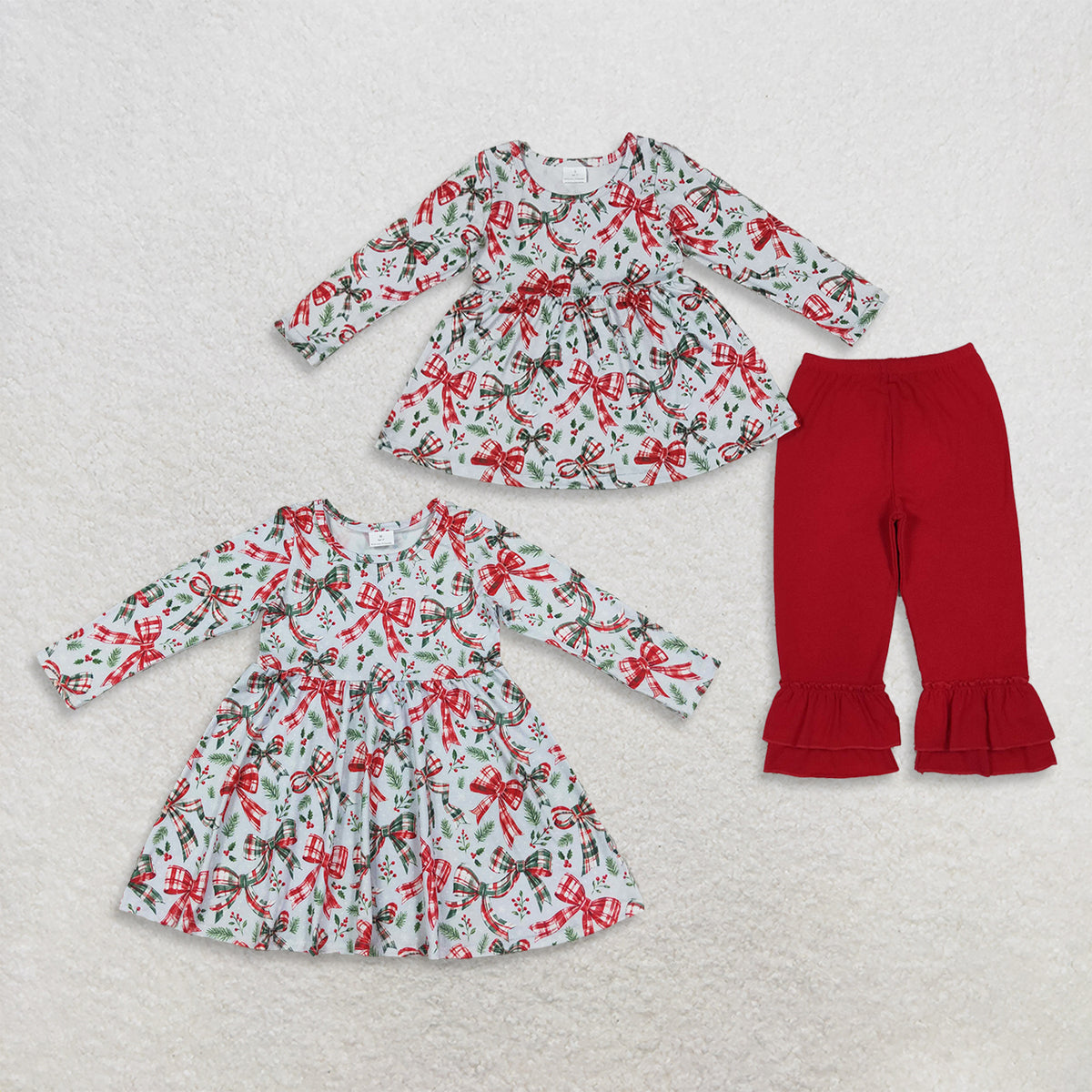 RTS NO MOQ Sibling milk silk Baby Girls Christmas Red Bow Holly Print Long Sleeve Top Solid Ruffle Pant Set Twirl Dress