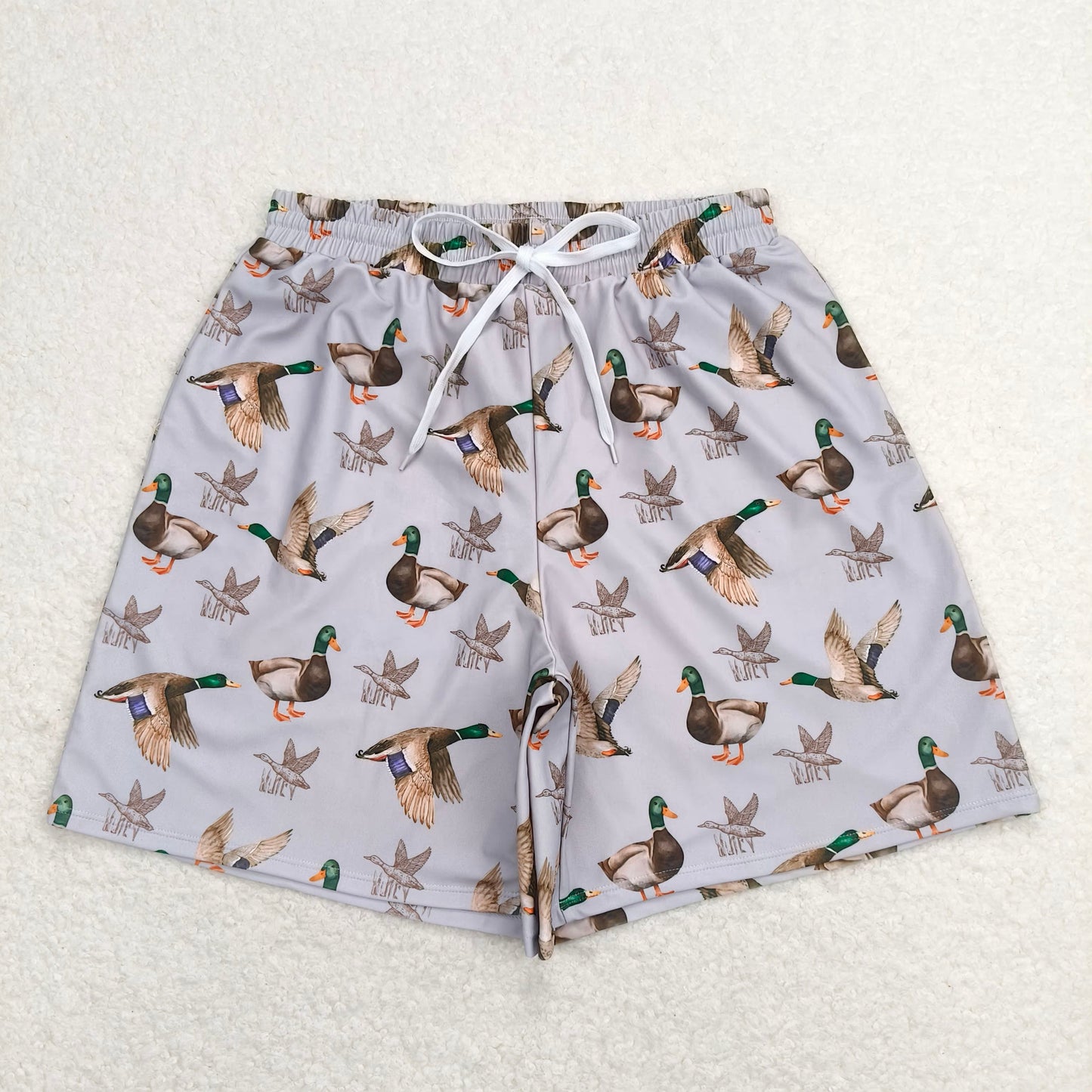 4.10  S0429 Adult male duck grey brown swimming trunks