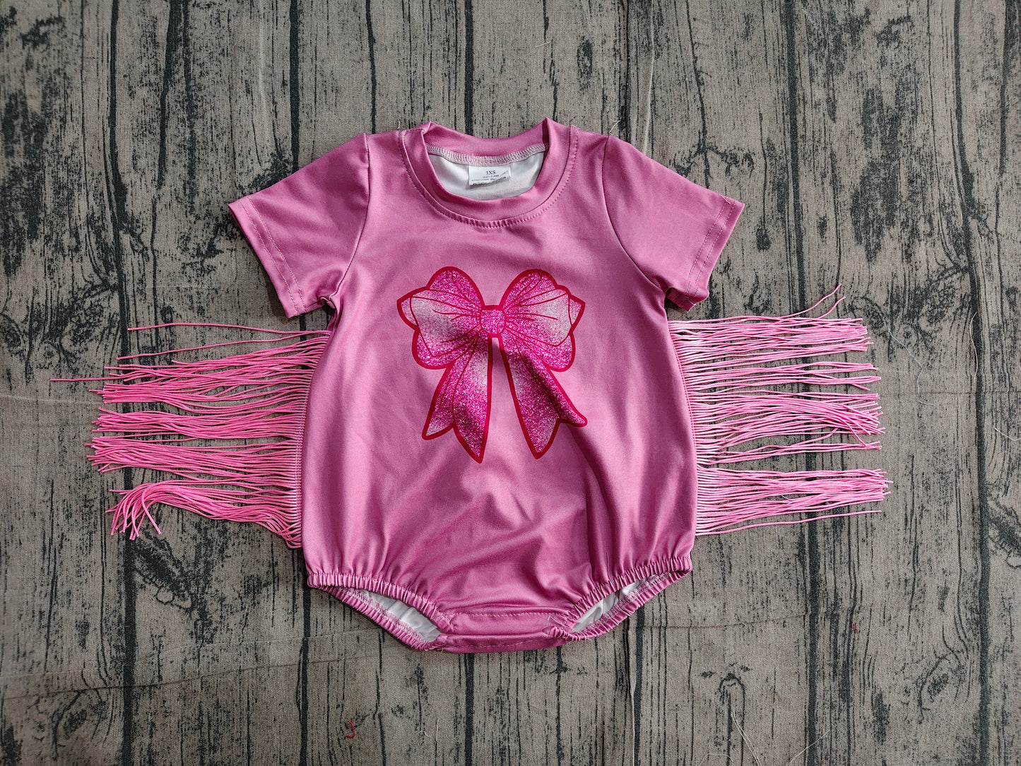 SR3187Baby Girls Pink Short Sleeves Bow Print Tassel Ruffle Rompers